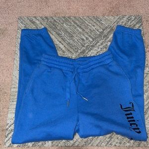 Hardly worn blue ‘Juicy’ sweatpants with cuffed ankles